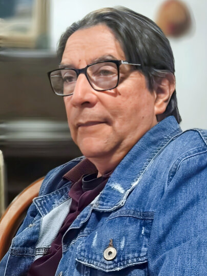 Foto do Gabriel sorrindo, transmitindo força e esperança